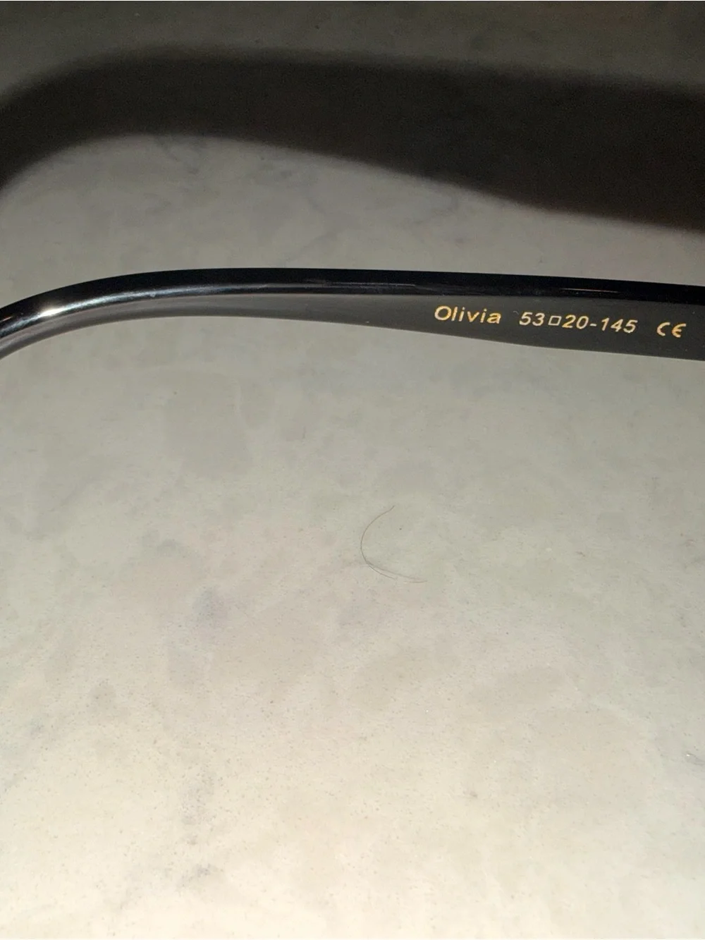 Karen Wazen “Olivia” Classic Black Oval Sunglasses